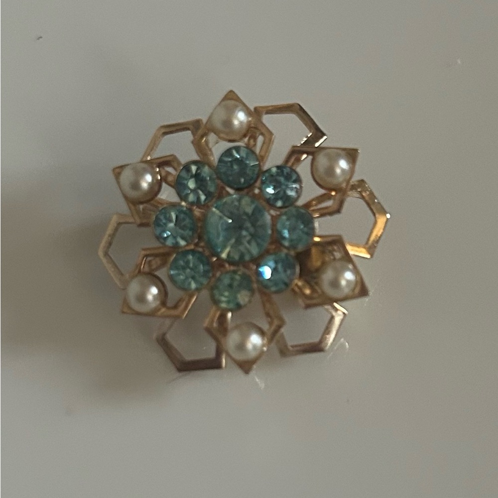 Vintage Gold Tone Metal and Faux Blue Topaz Floral Brooch